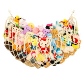 Diocos stuffed animal wall net in cream for tidy playroom storage.