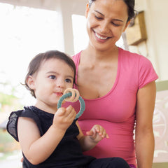 Dirbabi teether in use during playtime supports sensory exploration.