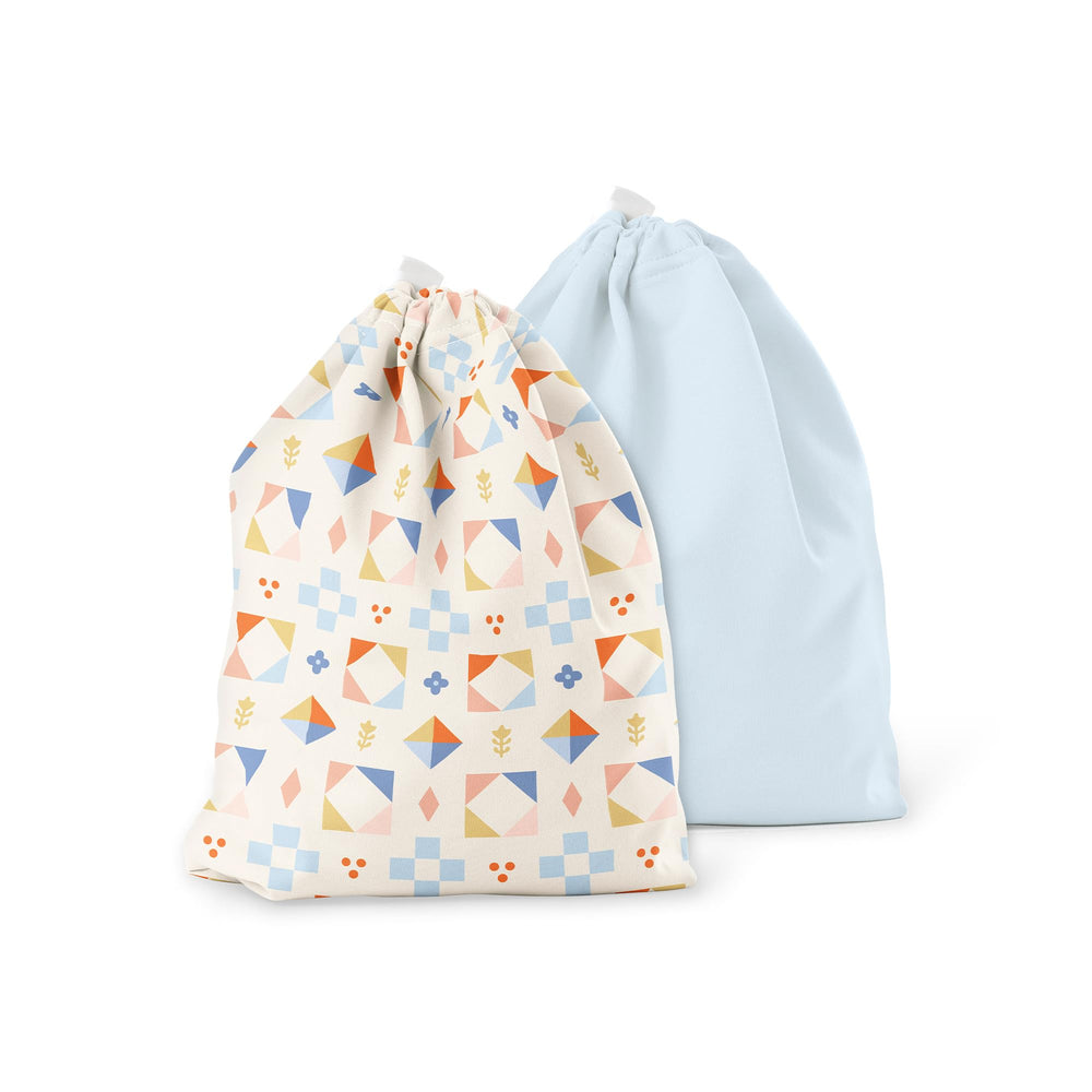 Esembly Ditty Bag Duo quilted front view shows compact diaper storage.
