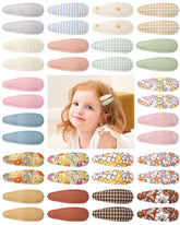 Doboi floral print baby hair clip keeps hair in place during play.