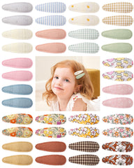 Doboi floral print baby hair clip keeps hair in place during play.
