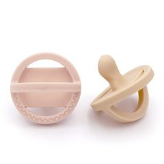 DODDLE & CO London POP pacifier angled-handle gum-massager for soothing gums.