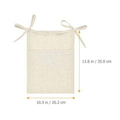 DOITOOL Linen Bedside Hanging Storage Bag stores small toys and books within reach