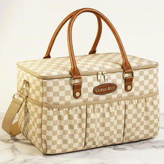 DOKUS & CO Luxe Caddy tote front view for organized baby and pet essentials on the go.