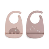 Done by Deer Ozzo Powder bib with large pocket catching crumbs during meals.
