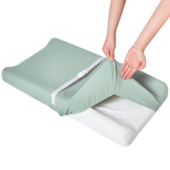 Donomilo changing pad cover with elastic bottom for quick changes.
