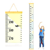 DOOLMIN baby height growth chart on wall with waterproof canvas for lasting display.