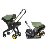 DOONA car seat and stroller in desert green, effortless transition for on-the-go families.