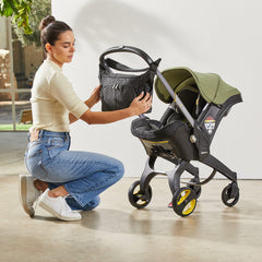 DOONA Essentials Bag includes foldable changing mat for on-the-go diaper changes.