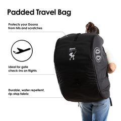 DOONA padded travel bag in black, side view, easy to carry.