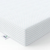 Dourxi mini crib mattress top view, showing a snug fit for compact cribs