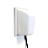 Dreambaby Dual Fit Plug Cover on outlet showing full coverage for safety.