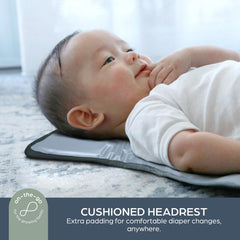 Dreambaby Fold and Go with zippered pocket for phone and keys.