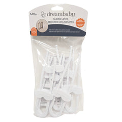 Dreambaby sliding locks on a white cabinet, keeping curious kids out