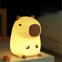 Dreaming My Dream capybara lamp emits a soft glow for cozy nights