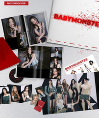 Dreamus BABYMONSTER BABYMONS7ER photobook interior pages with vibrant artwork