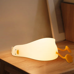 Drecoam Duck Night Light lying-flat duck glowing softly in a nursery