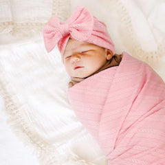 DRESHOW BQUBO bow hat on a tiny head for a cute look