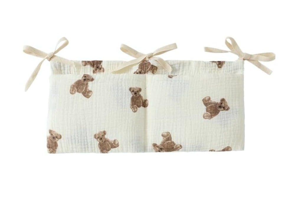 Dwuww white bedside hanging bags holding milk bottles for easy access