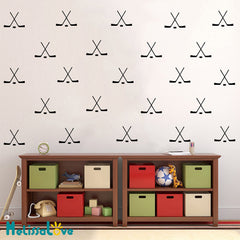 Black hockey cross sticks decal on a smooth wall creates a painted-wall look