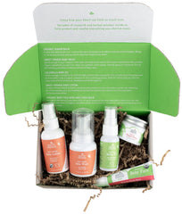 Earth Mama gift box ready for a baby shower, five organic care items displayed
