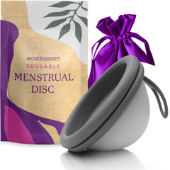 EcoBlossom reusable disc in hand shows flexible, comfortable fit.