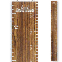 Eersida growth chart mounted on wall, a stylish wooden ruler to track kids' height.