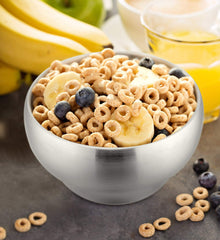 E-far bowls held by a child demonstrate comfortable grip and heat resistance