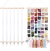Eforwest headband holder on nursery wall displaying bows for easy access and organization.