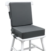 Eiury booster seat on dining table, front view showing secure fit for toddlers.