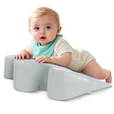 EKEPE nursing reflux prop demonstrates inclined support for gentle gas relief during feeding