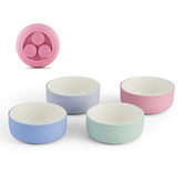Elk and Friends kids porcelain bowls with suction sleeve on table for mess-free meals.