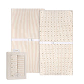 Ely's & Co changing pad cover pink linear floral close-up showing soft fabric.