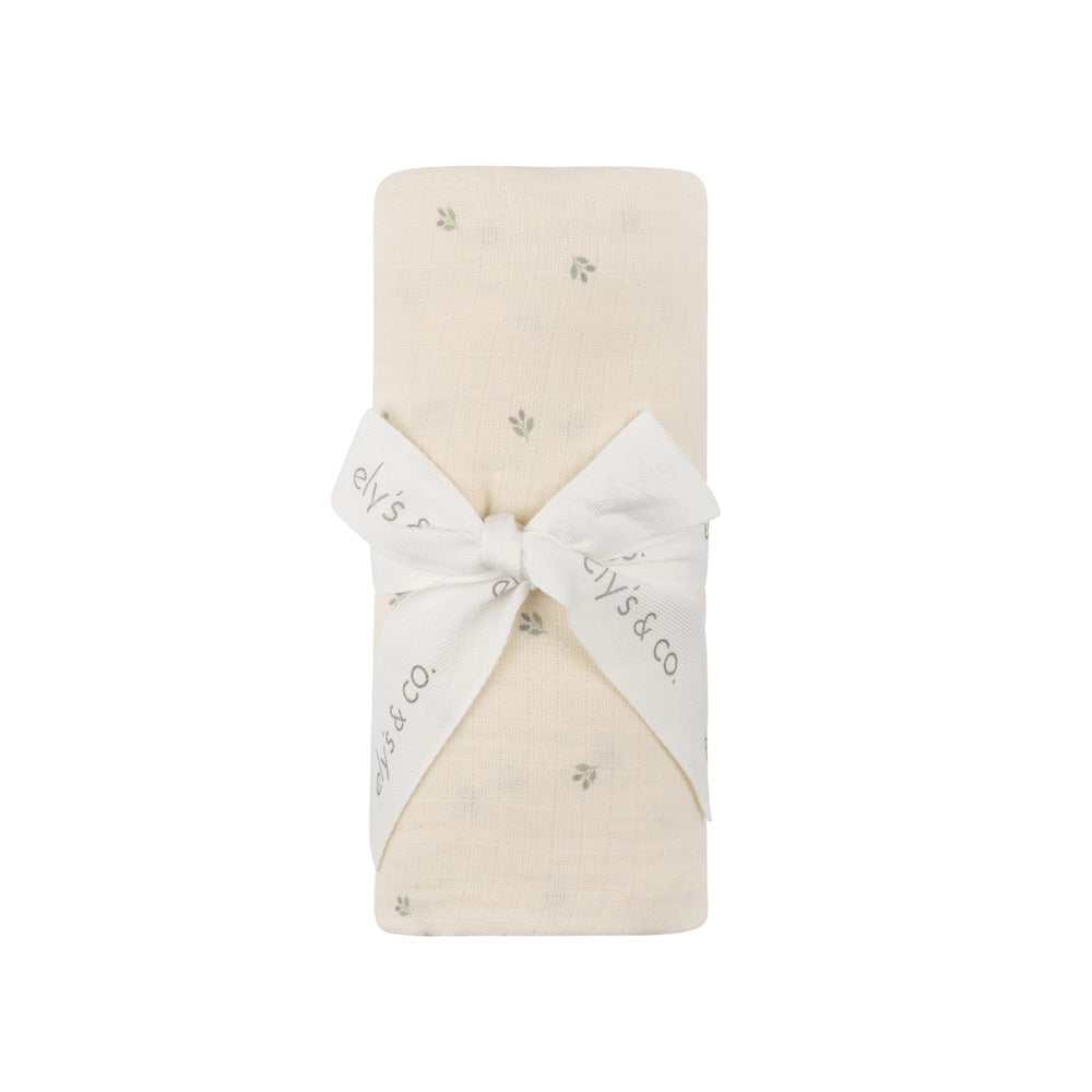 Ely's & Co. cotton muslin swaddle blanket in ivory berry offers soft, breathable cuddling.