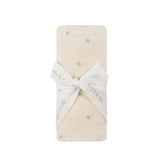 Ely's & Co. cotton muslin swaddle blanket in ivory berry offers soft, breathable cuddling.