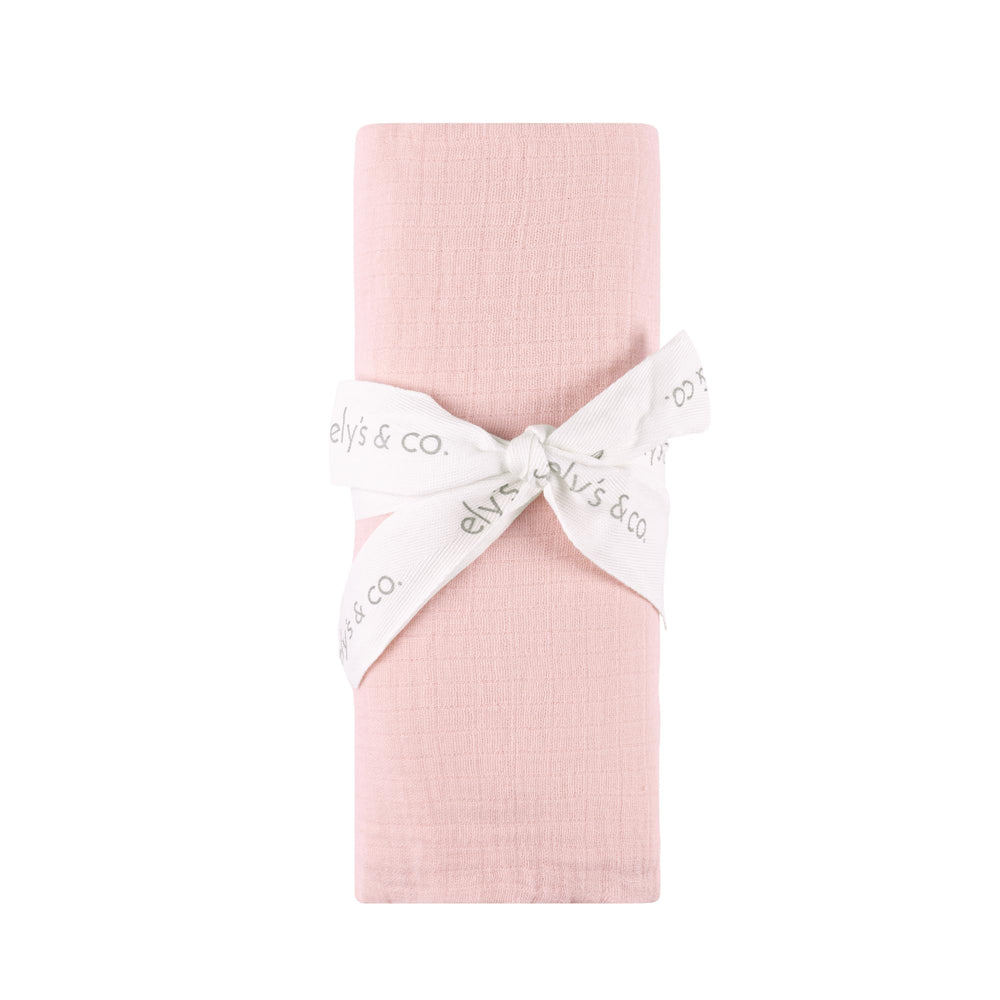 Ely's & Co cotton muslin swaddle blanket with pink scallop trim for breathable baby comfort.