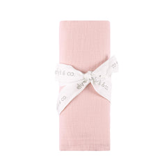 Ely's & Co cotton muslin swaddle blanket with pink scallop trim for breathable baby comfort.