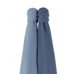 Gift-ready packaging featuring the Indigo blue swaddle set for a baby shower.