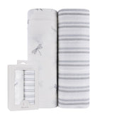 Ely's & Co muslin swaddle blanket with blue dragonflies print for gentle soothing.