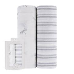 Ely's & Co muslin swaddle blanket with blue dragonflies print for gentle soothing.