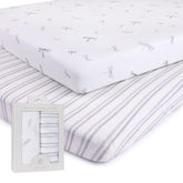 Ely's & Co. Pack n Play sheets in blue dragonflies and stripes offer a snug, stylish fit.