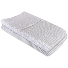 Ely's & Co cradle sheet with waterproof liner protects a cradle mattress.