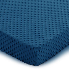 Entisn navy blue crib sheets on a standard mattress for a cozy sleep setup