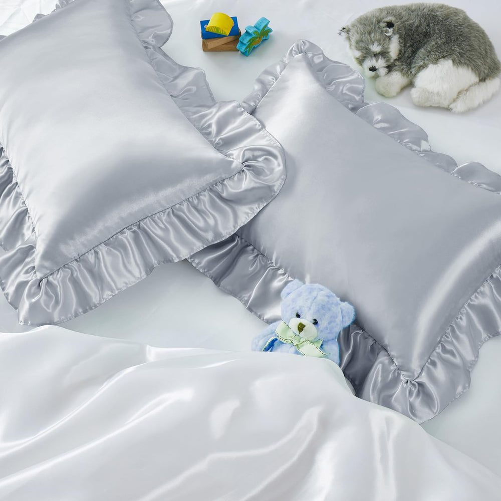 Entisn ruffle satin toddler pillowcase close-up shows silky texture for gentle sleep