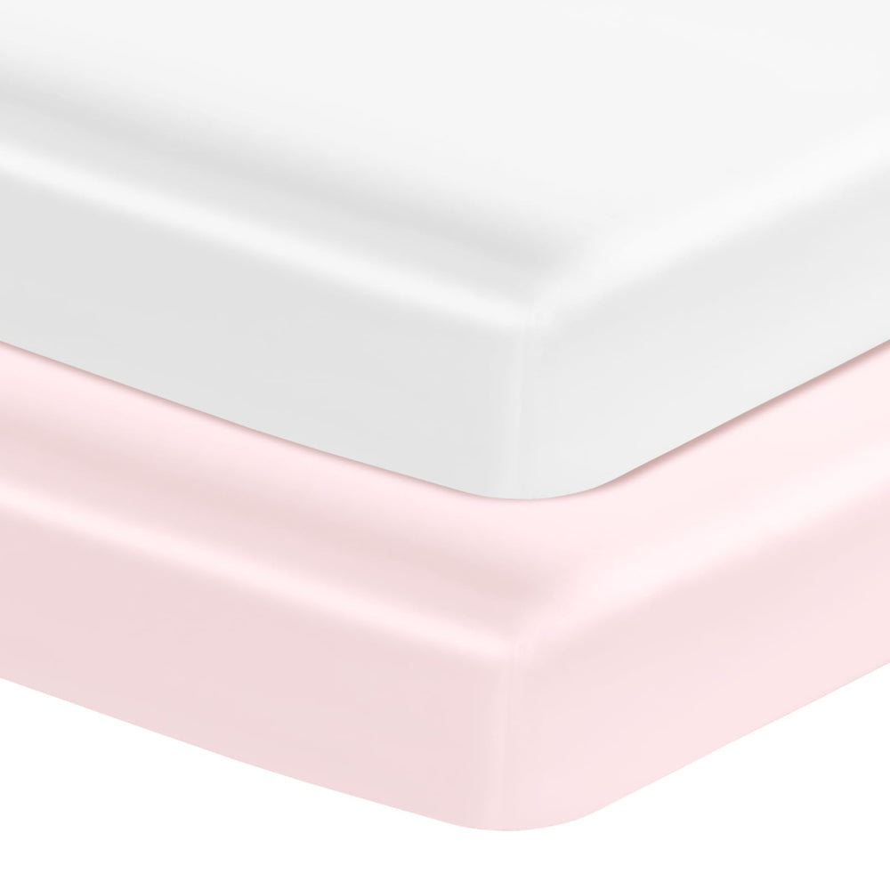 Entisn satin crib sheets 2-pack in white and pink for a plush nursery look