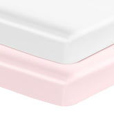 Entisn satin crib sheets 2-pack in white and pink for a plush nursery look
