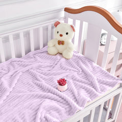 Eonkasp blanket draped over crib highlighting reversible stripes