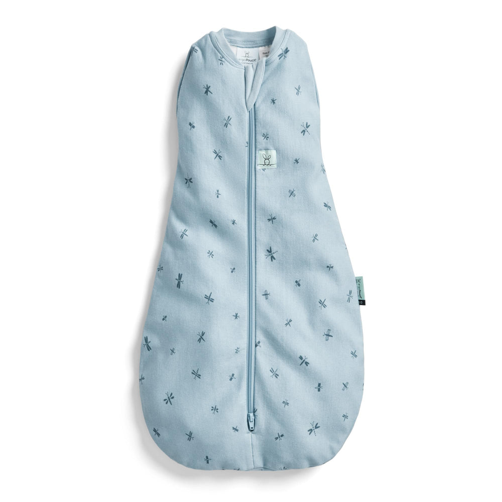 ErgoPouch Cocoon Swaddle Sack Dragonflies pattern keeps baby snug for sleep.