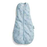 ErgoPouch Cocoon Swaddle Sack Dragonflies pattern keeps baby snug for sleep.