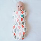 ergoPouch Cocoon Swaddle Sack 0.2 tog Blush Leaf close-up: soft organic cotton for newborn comfort.